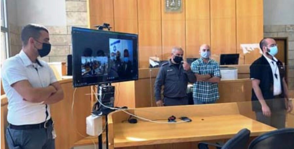 فيديو وصور من قاعة محكمة الأسرى الأربعة